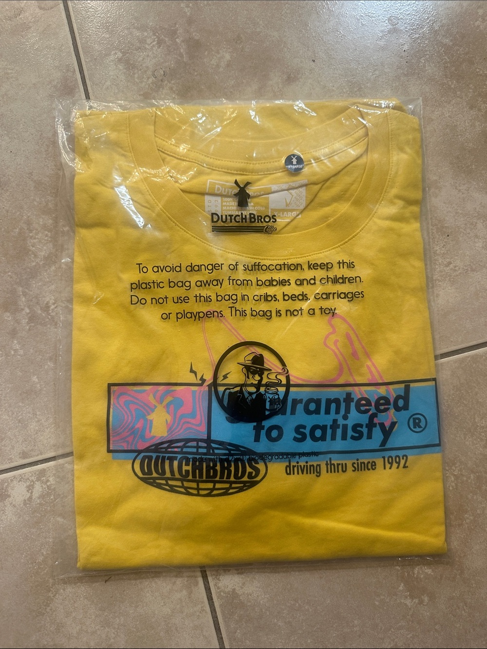 Dutch Bros Yellow Kids Graphic Tee with Blue & Pink Accents